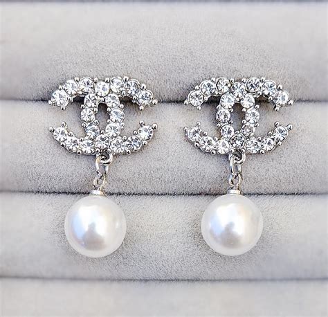 chanel earring advertisement pearl logo|chanel pearl earrings vintage.